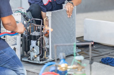 Repair Being Conducted by an Air Conditioning Contractor in Peoria IL