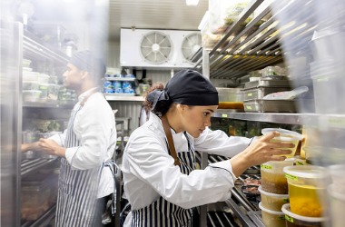 chefs work in a commercial refrigeration unit