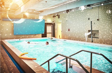 An indoor pool is seen. Merit Mechanical performs pool dehumidification.