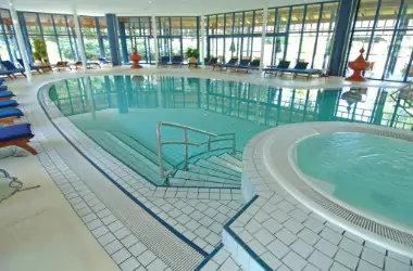 An indoor pool is seen. Merit Mechanical provides Pool Dehumidification in Lacon IL